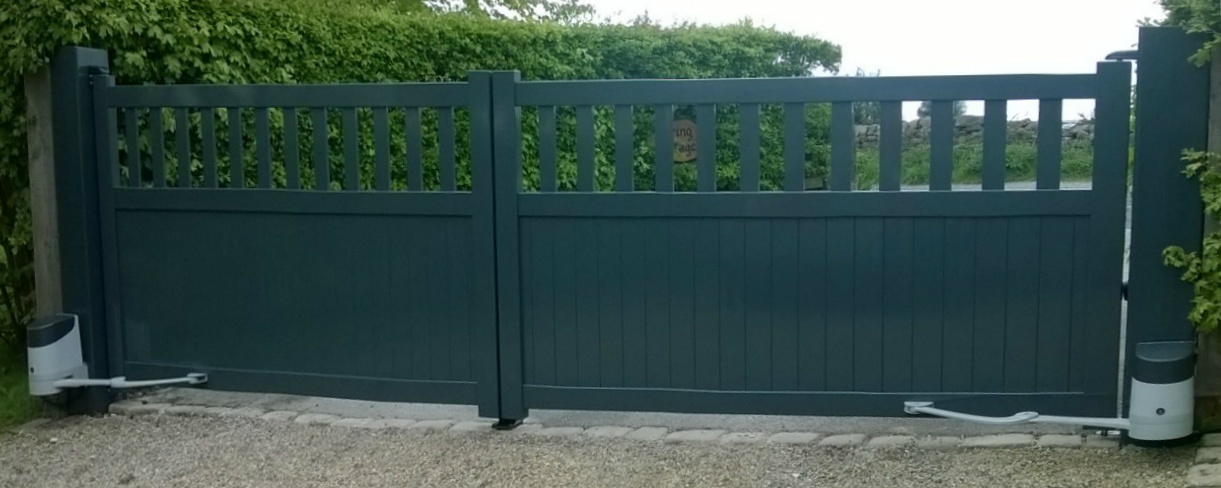 green automated gate on driveway